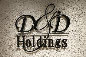 D&D Holdings signage and logo