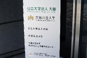 Signage and logo of  Osaka Metropolitan University Corporate Headquarters