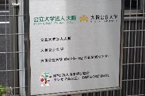 Signage and logo of  Osaka Metropolitan University Corporate Headquarters