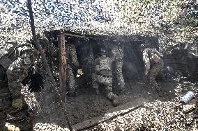 Ukrainian artillery personnel fight in Zaporizhzhia region