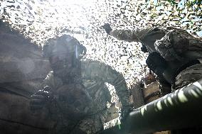 Ukrainian artillery personnel fight in Zaporizhzhia region