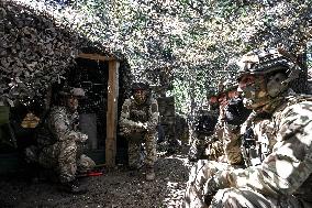 Ukrainian artillery personnel fight in Zaporizhzhia region