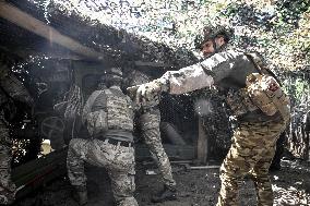 Ukrainian artillery personnel fight in Zaporizhzhia region