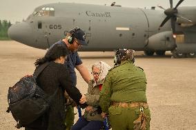 RCAF Assists Evacuees from Manitoba Wildfires - Canada
