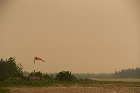 RCAF Assists Evacuees from Manitoba Wildfires - Canada