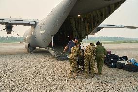 RCAF Assists Evacuees from Manitoba Wildfires - Canada