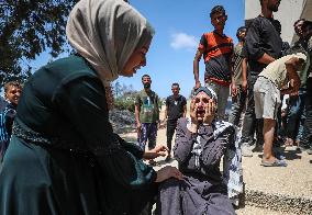 Palestinian Man Mourns Airstrike Victim - Gaza