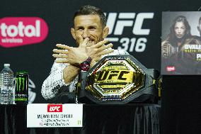 Merab Dvalishvili Gestures During the UFC 316 Press Conference