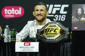 Merab Dvalishvili Gestures During the UFC 316 Press Conference