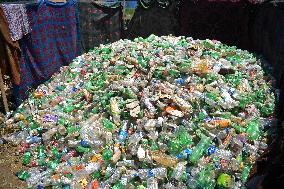 People Recycle Plastic Bottles - India