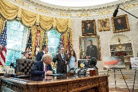 US Presdient Trump Speaks in the Oval Office at the White House on Fires and LA Protests