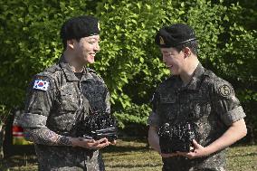 BTS members Jimin, Jung Kook discharged from S. Korea military