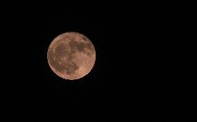 Strawberry Moon Over Iran