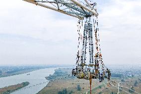 Workers on Power Transmission Line - China