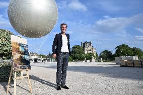 Macron Visits The Olympic Cauldron Reinstallation Site - Paris