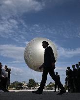 Macron Visits The Olympic Cauldron Reinstallation Site - Paris