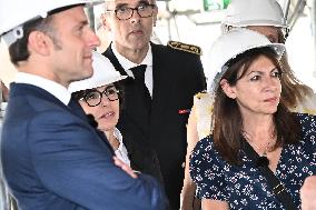 Macron Visits The Olympic Cauldron Reinstallation Site - Paris