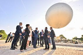 Macron Visits The Olympic Cauldron Reinstallation Site - Paris