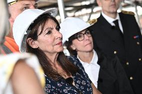 Macron Visits The Olympic Cauldron Reinstallation Site - Paris