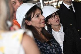 Macron Visits The Olympic Cauldron Reinstallation Site - Paris