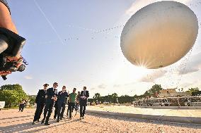 Macron Visits The Olympic Cauldron Reinstallation Site - Paris