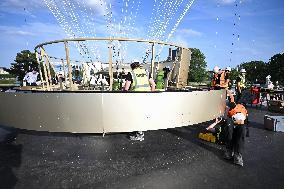 Macron Visits The Olympic Cauldron Reinstallation Site - Paris