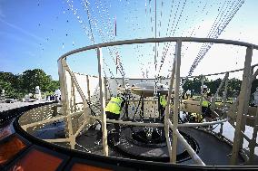 Macron Visits The Olympic Cauldron Reinstallation Site - Paris