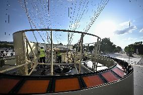 Macron Visits The Olympic Cauldron Reinstallation Site - Paris