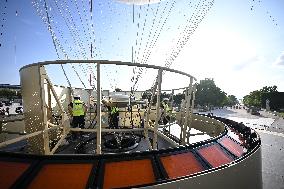Macron Visits The Olympic Cauldron Reinstallation Site - Paris