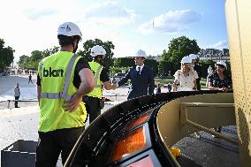 Macron Visits The Olympic Cauldron Reinstallation Site - Paris