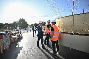 Macron Visits The Olympic Cauldron Reinstallation Site - Paris