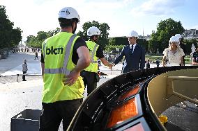 Macron Visits The Olympic Cauldron Reinstallation Site - Paris