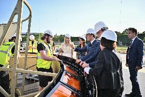 Macron Visits The Olympic Cauldron Reinstallation Site - Paris