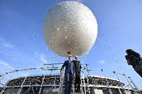 Macron Visits The Olympic Cauldron Reinstallation Site - Paris