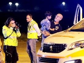 Humanitarian Flight Arrives from Gaza - Milan