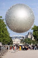 Emmanuel Macron visits the Olympic cauldron at the Tuileries - Paris