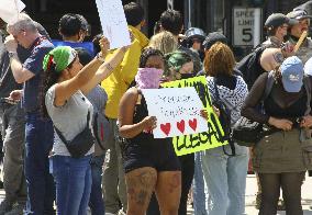 Immigration raid protests