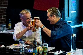 Carney And Starmer Watch Ice Hockey Match in Pub - Ottawa