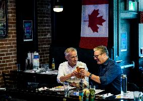 Carney And Starmer Watch Ice Hockey Match in Pub - Ottawa