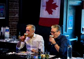 Carney And Starmer Watch Ice Hockey Match in Pub - Ottawa
