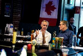 Carney And Starmer Watch Ice Hockey Match in Pub - Ottawa