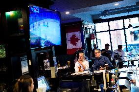Carney And Starmer Watch Ice Hockey Match in Pub - Ottawa