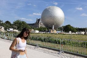 Installation of the Olympic cauldron at the Tuileries - Paris
