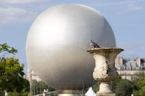 Installation of the Olympic cauldron at the Tuileries - Paris
