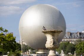 Installation of the Olympic cauldron at the Tuileries - Paris