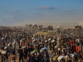 Thousands Of Starving Palestinians In Gaza Flock To The Aid Distribution Center