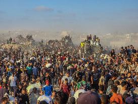 Thousands Of Starving Palestinians In Gaza Flock To The Aid Distribution Center