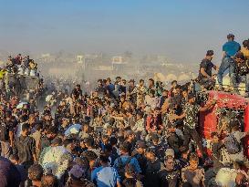 Thousands Of Starving Palestinians In Gaza Flock To The Aid Distribution Center