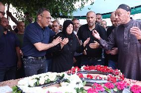 Mourners in Tamra After Iranian Missile Attack Amid Escalating Conflict