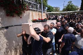Mourners in Tamra After Iranian Missile Attack Amid Escalating Conflict